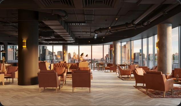 Brown leather armchairs fill a spacious modern lounge with light herringbone floors, set against exposed dark ceiling pipes and panoramic floor-to-ceiling windows overlooking a cityscape at sunset.